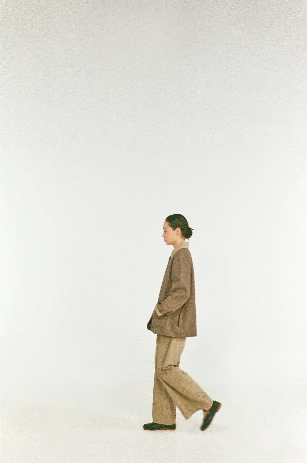 model wearing shay pants handwoven square texture hem detail