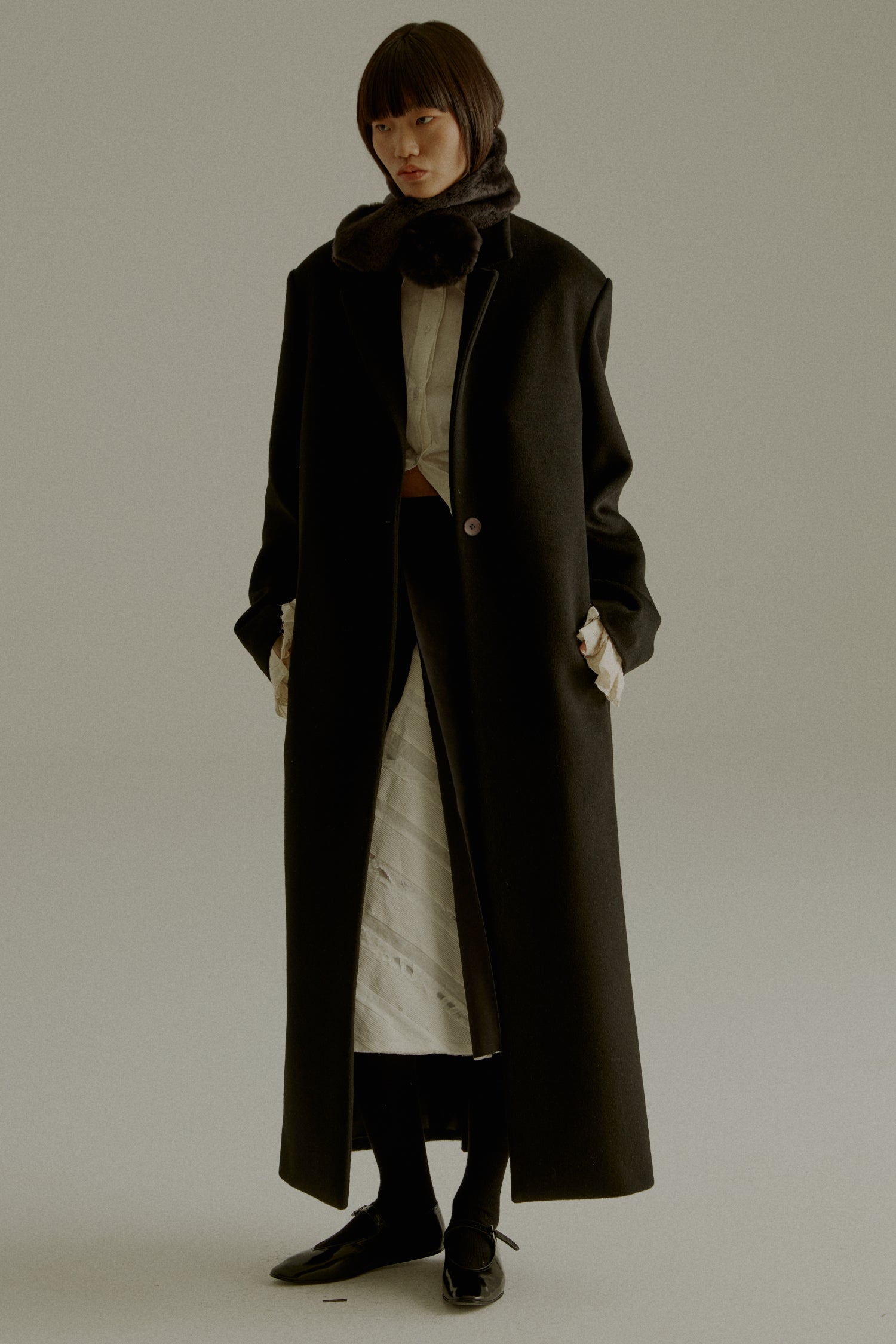 UNISECON AW23 CHARLIE COAT - Super Fine Wool, Long Black Coat, Laced Cuffs - pocket