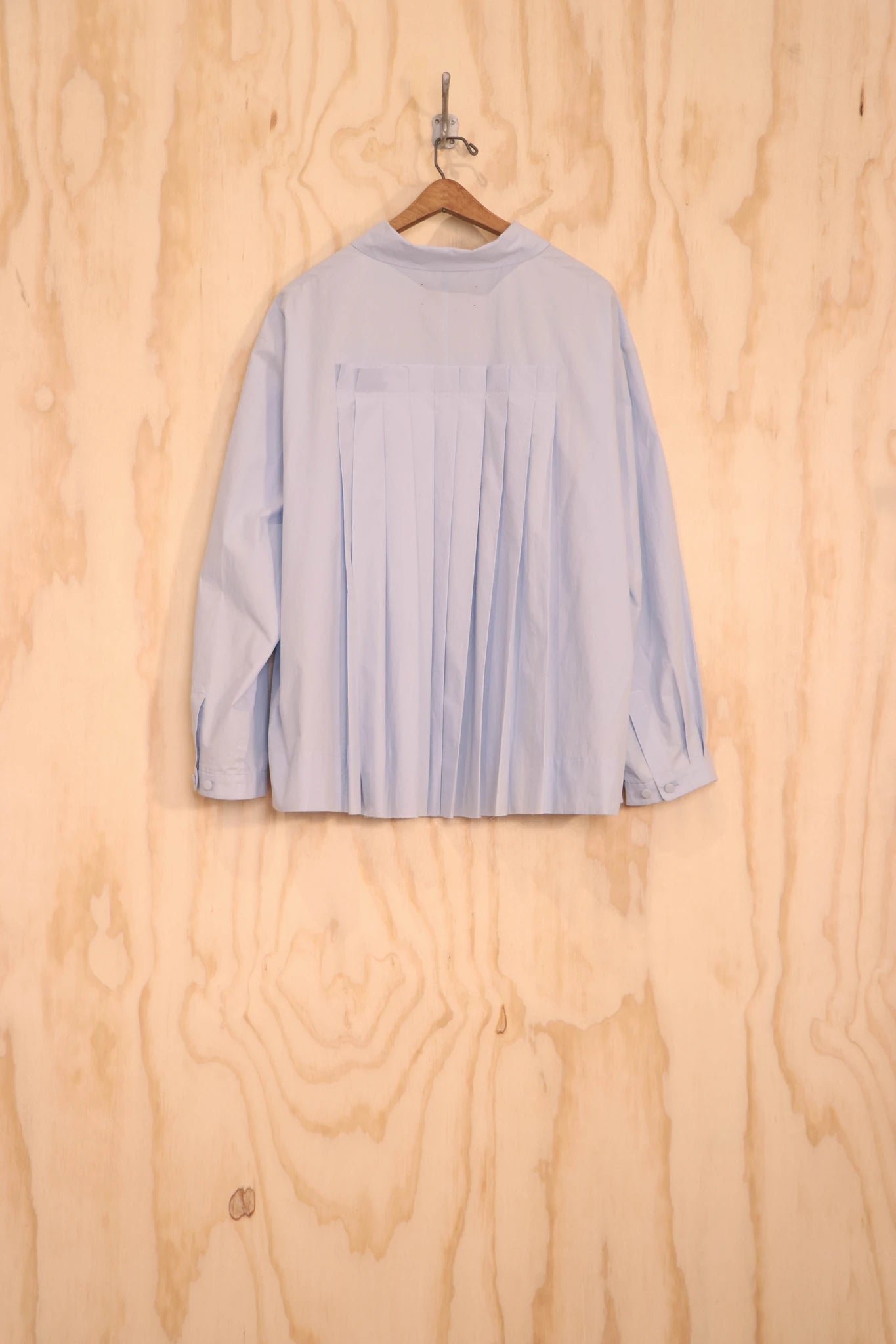 Bea Top back view showing multi-pleated panel for movement.