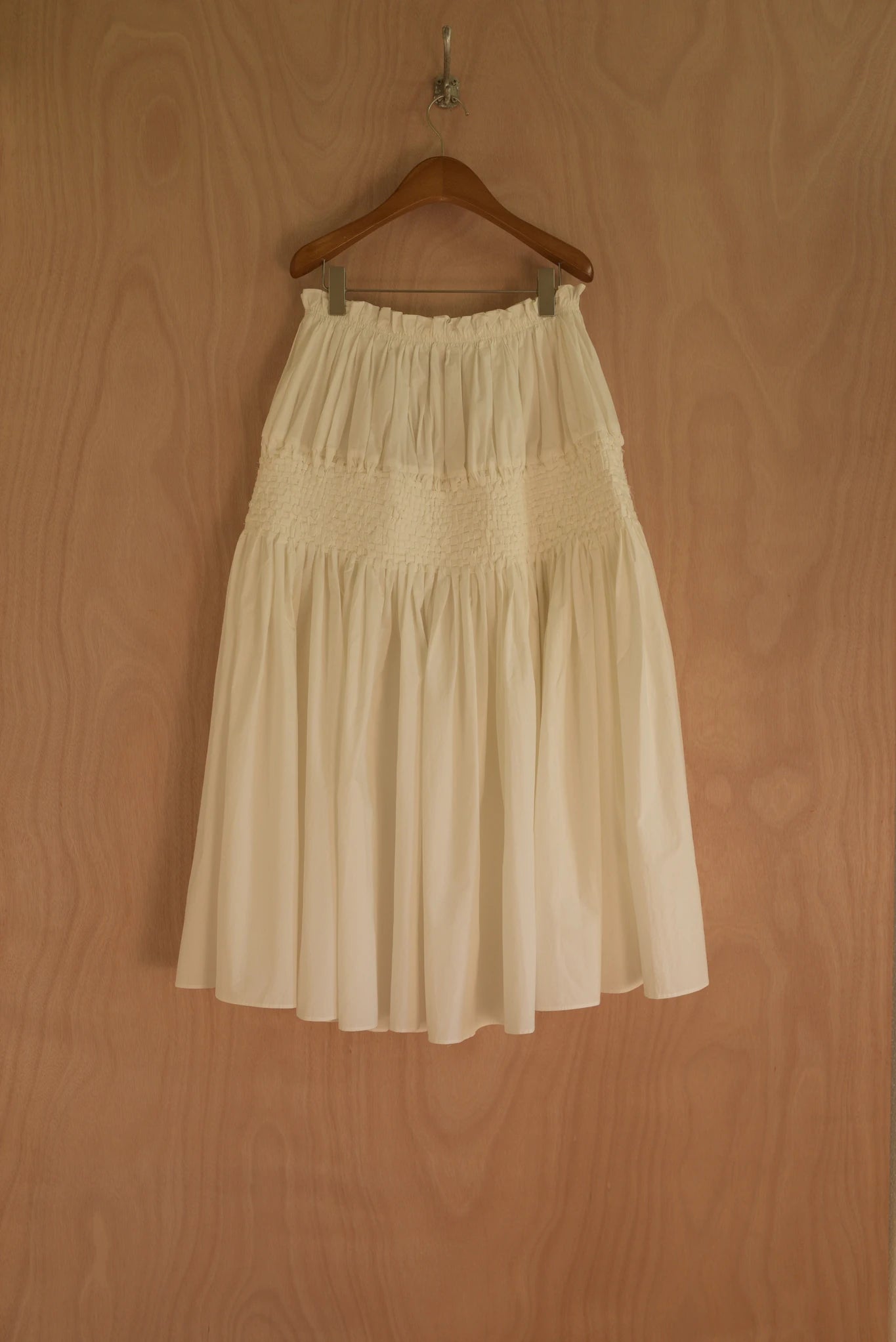 Back view showing volume and clean silhouette