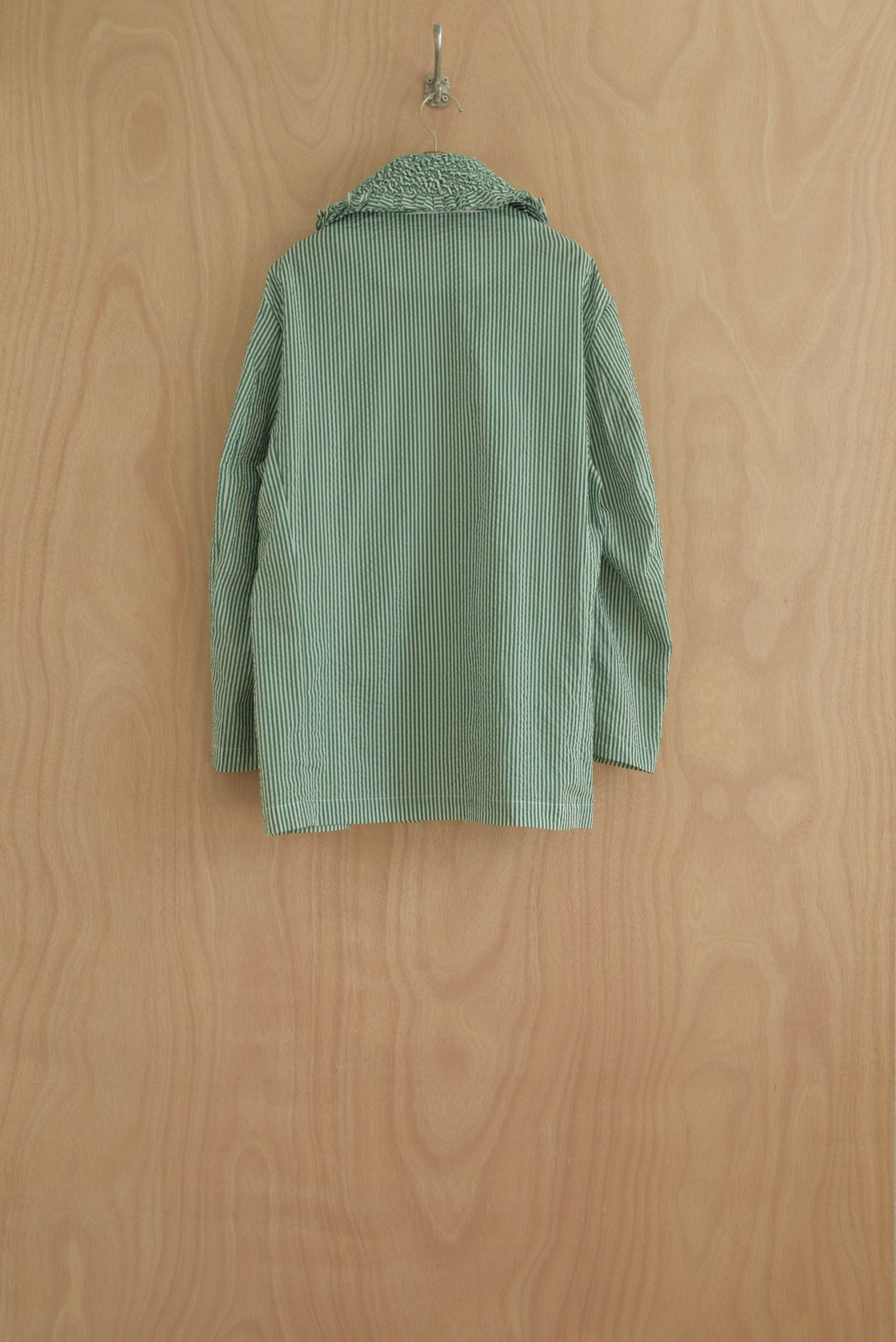 Close-up of soft puckered Japanese cotton fabric in green and white