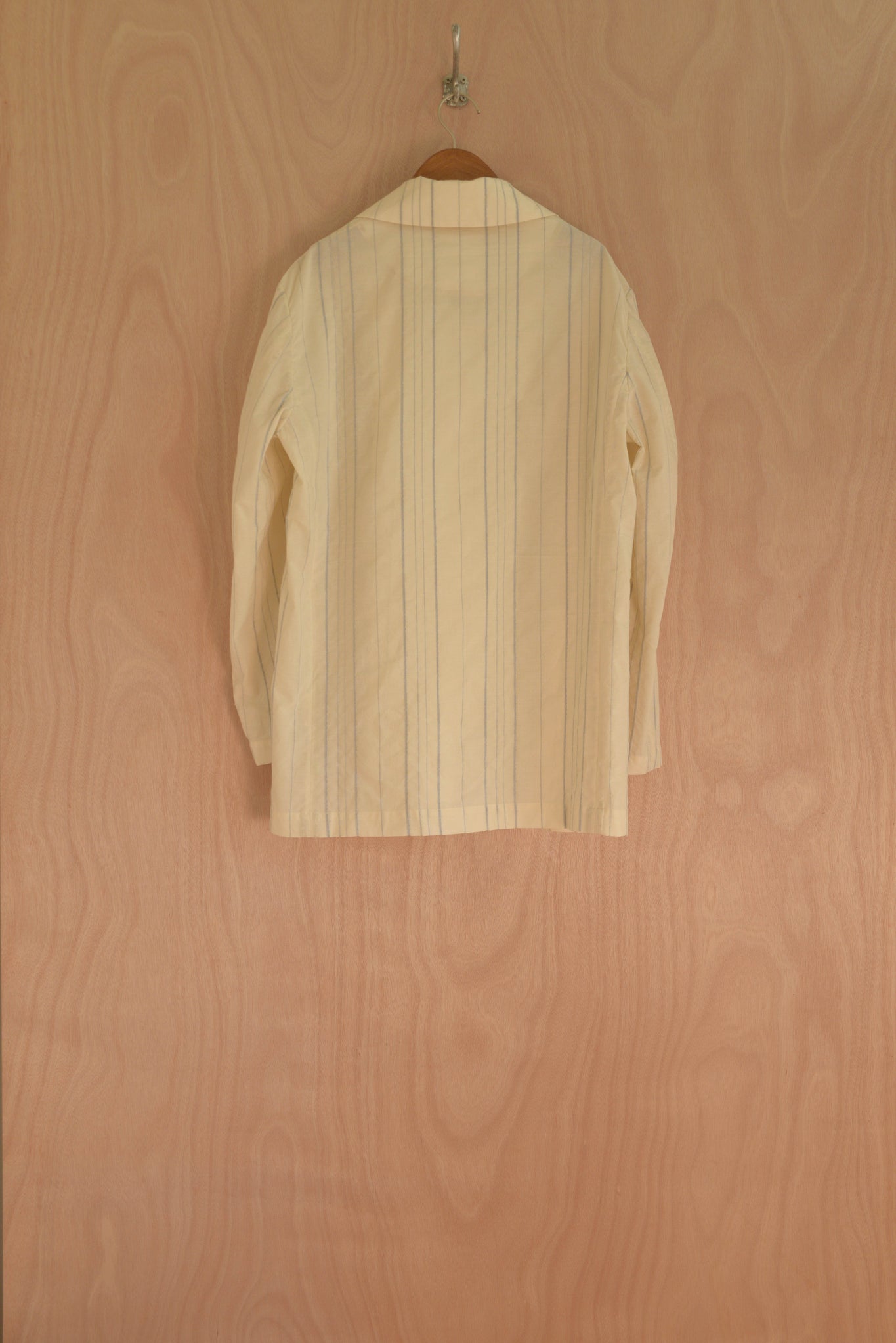 Nicole Jacket back view with vertical stripe placement and soft drape