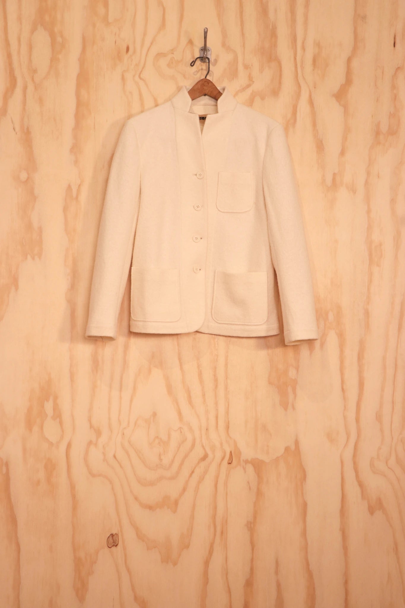 Front view of Patcha Jacket in ivory wool–cotton with straight collar