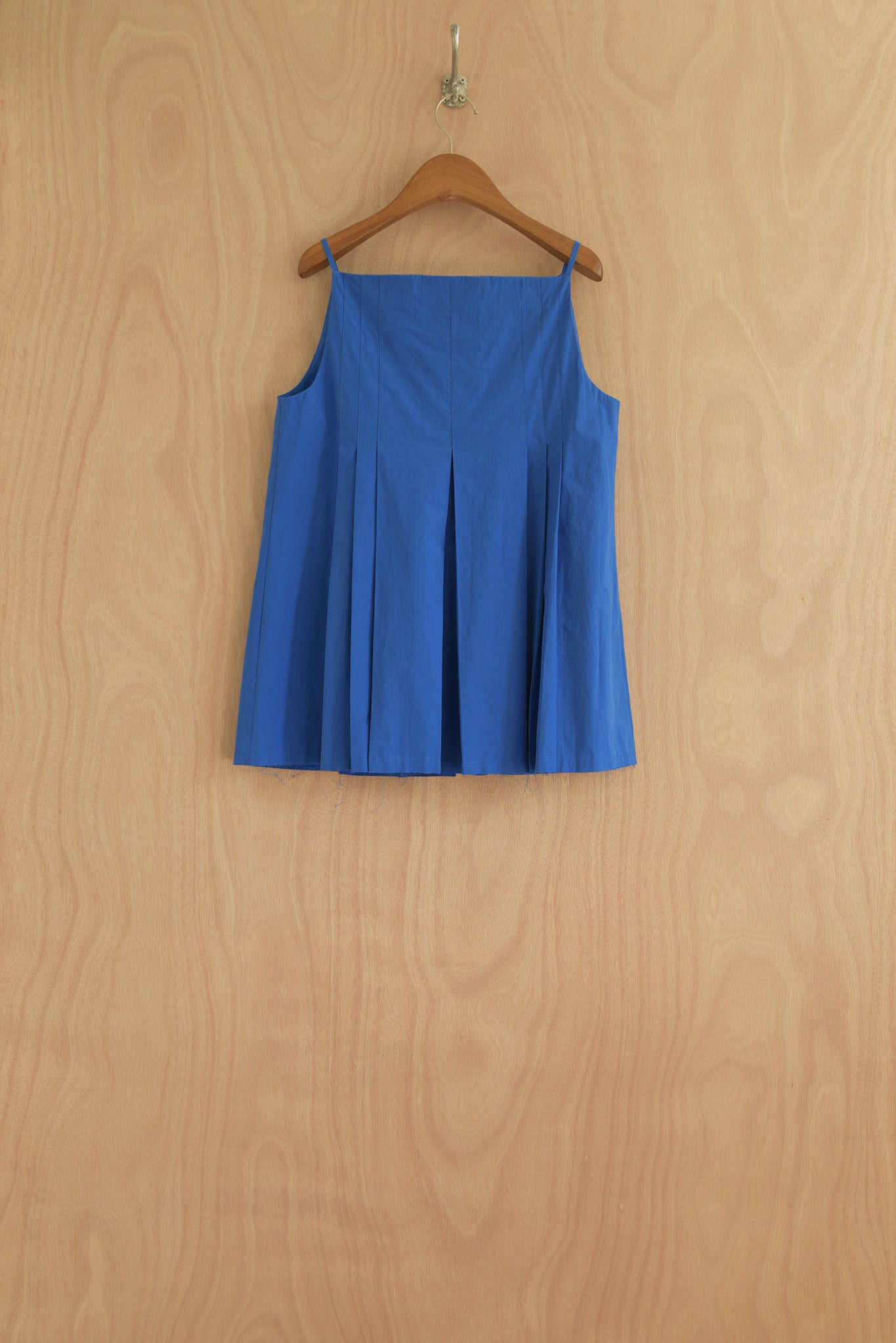  Sharrin Top back view with soft pleats and a clean drape