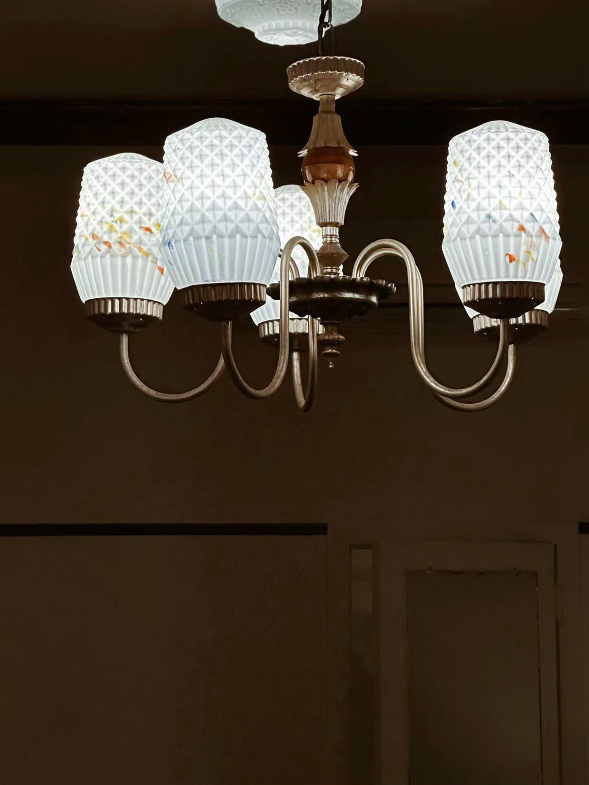 colored-glass lamps inside the UNISECON store