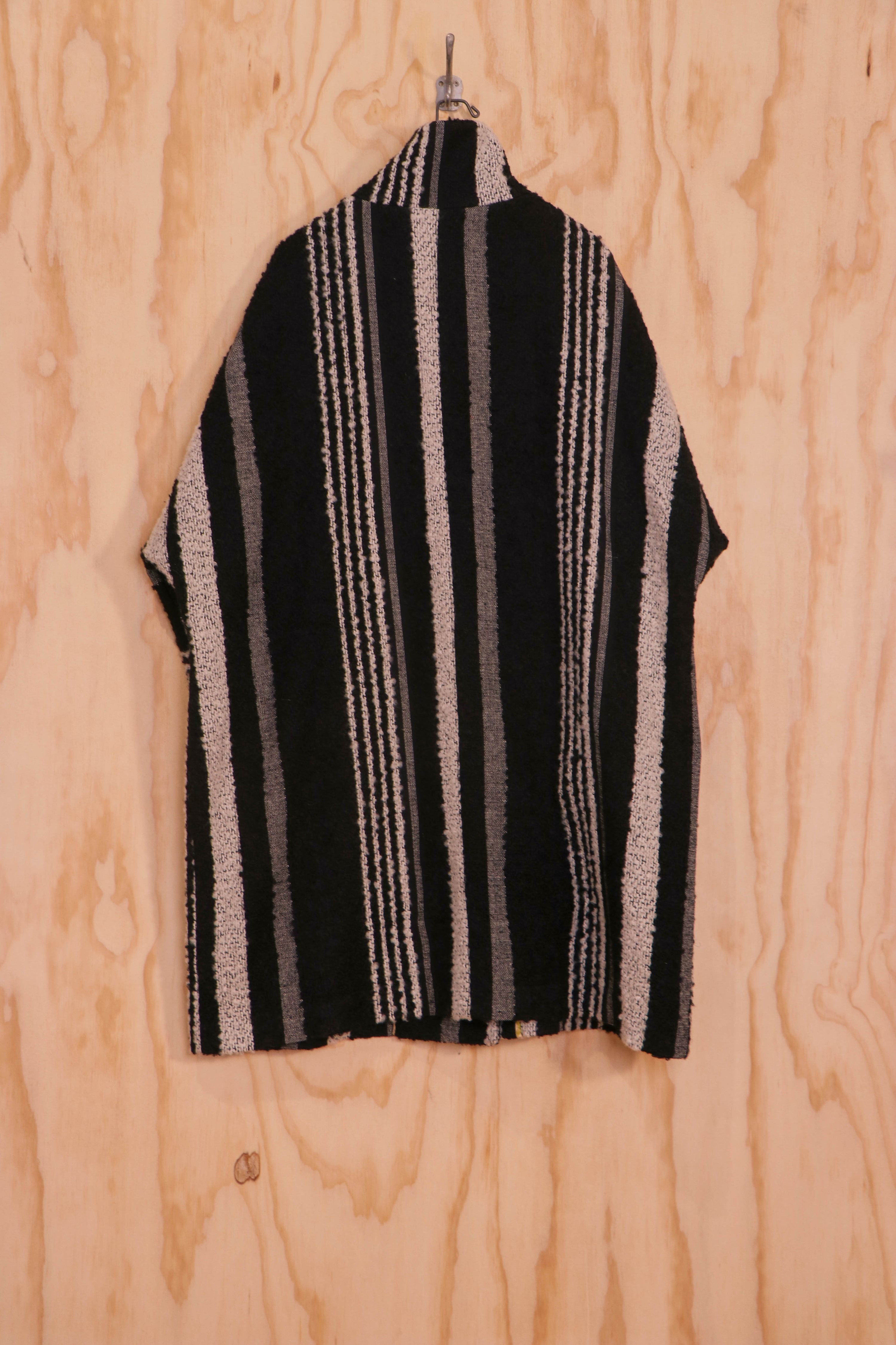 Talia Coat on model, striped mohair–wool, side view showing volume