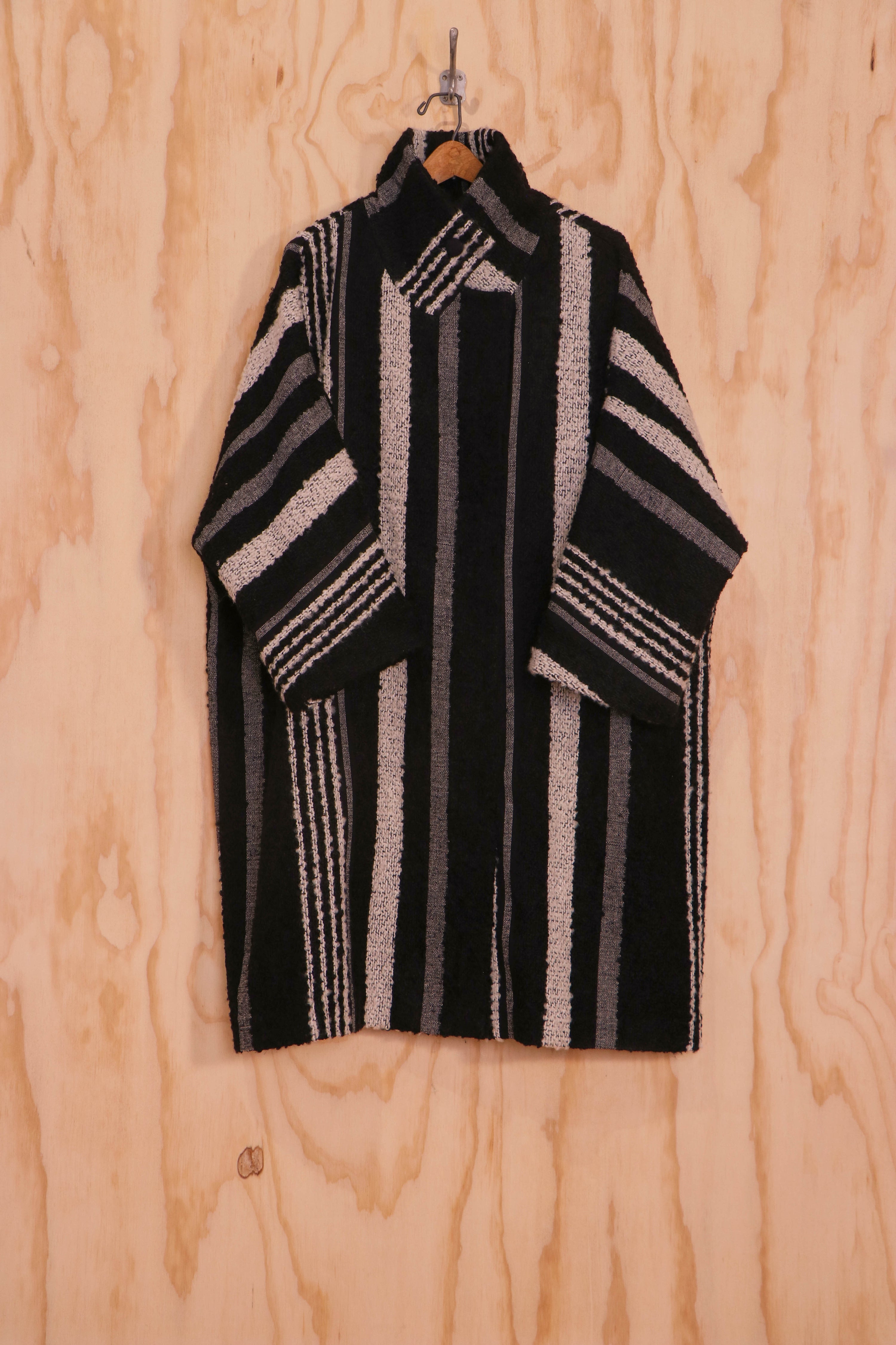 Front: Talia Coat on model, striped mohair–wool, front view with stand collar