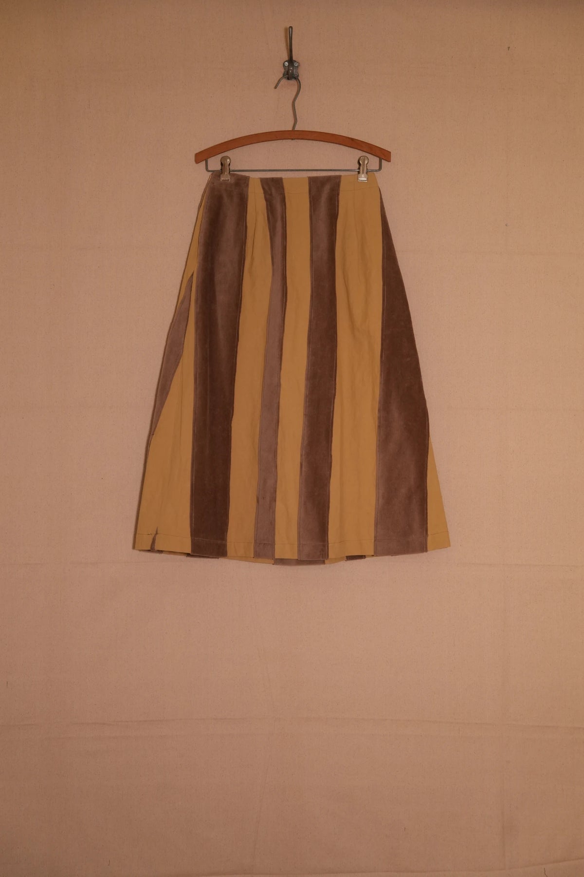 lola skirt in yellow, with contrasting vertical fabric panels — the lodge, fall / winter 2026