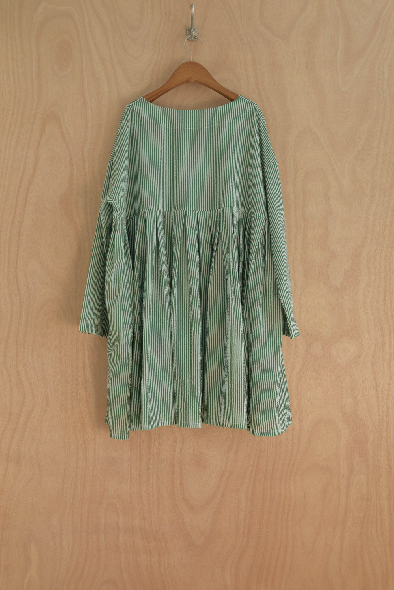 Ula Top back view showing full silhouette and soft gathered layers