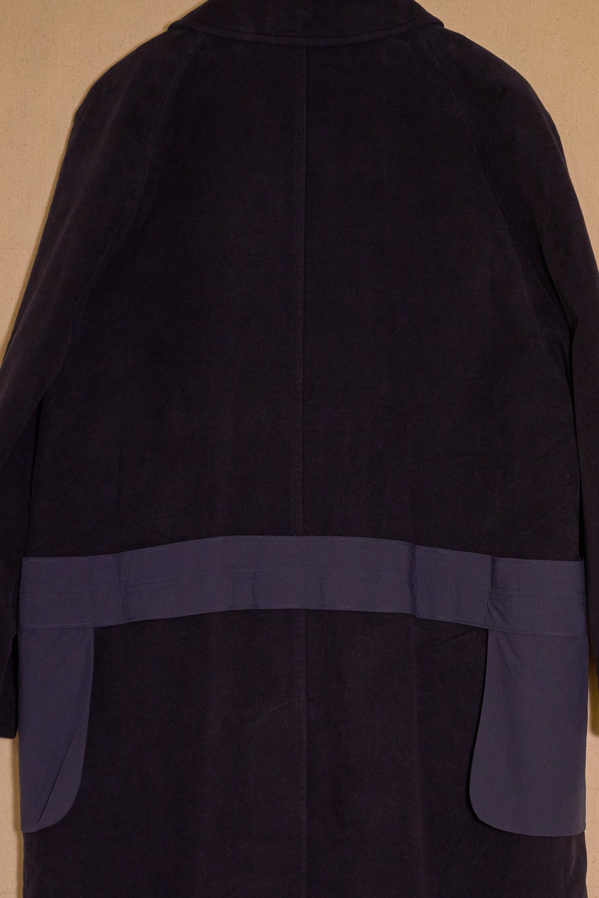 UNISECON Alma coat in blue detail view