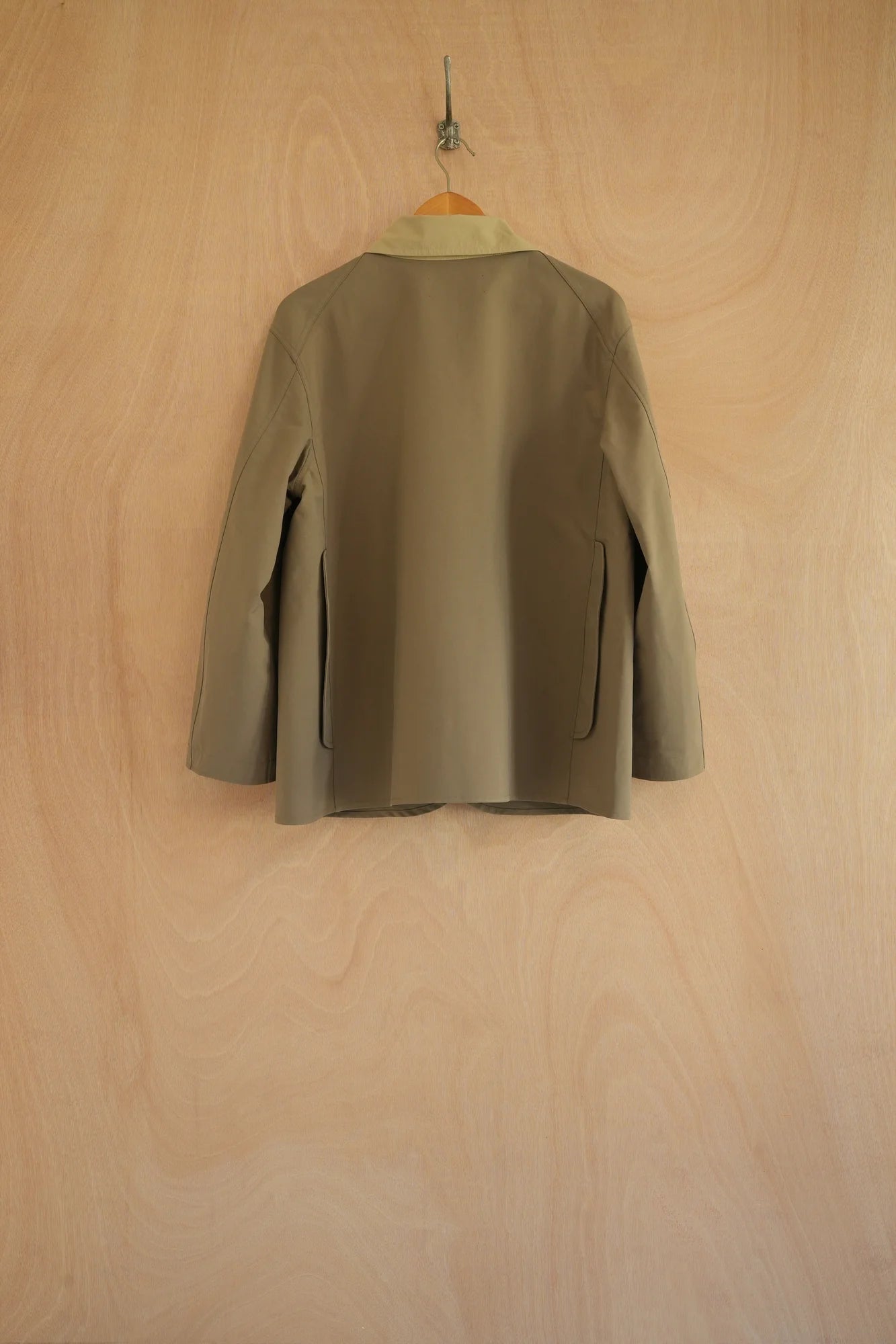 UNISECON Edna jacket in olive/taupe, back view