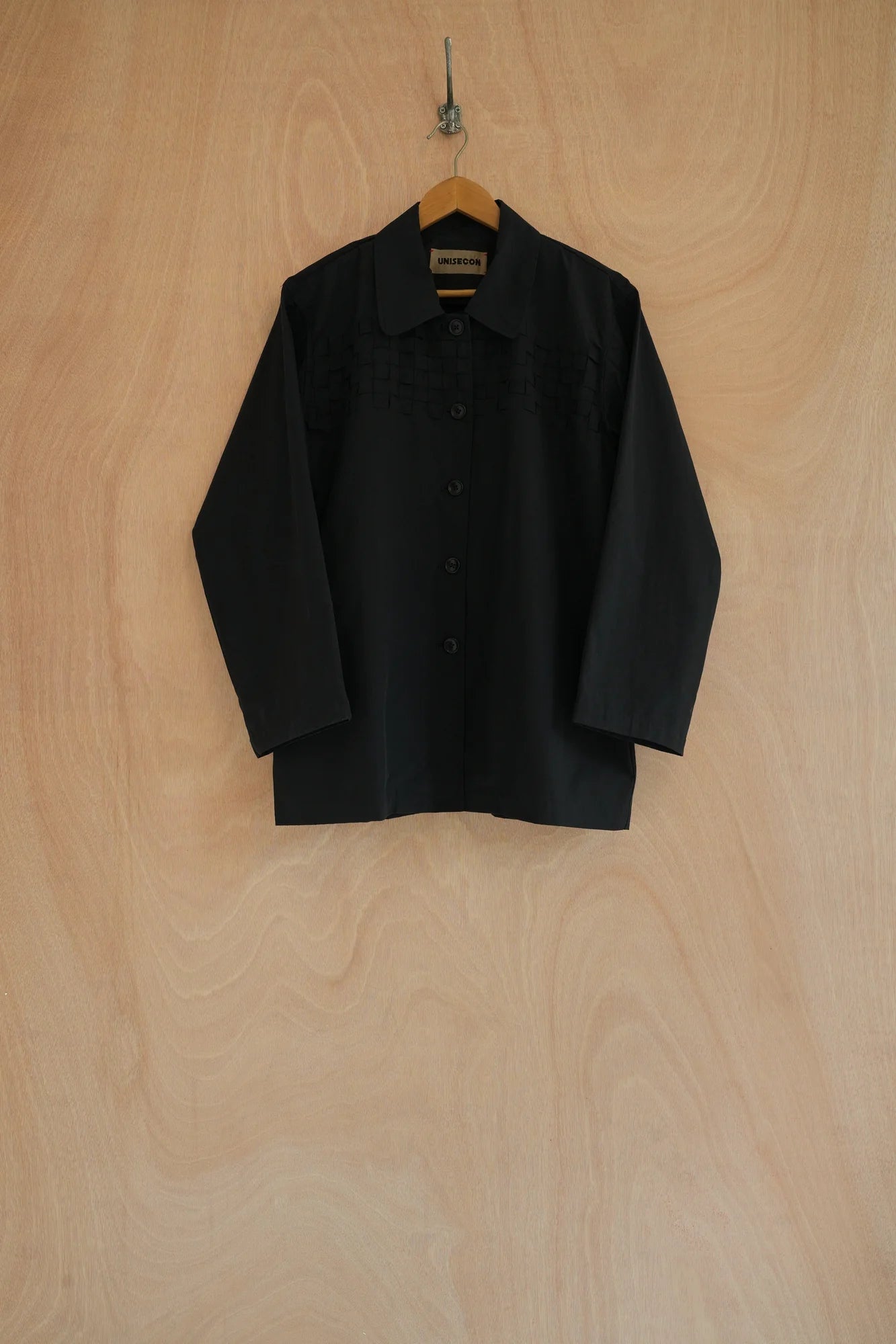 UNISECON knight jacket in black, front view