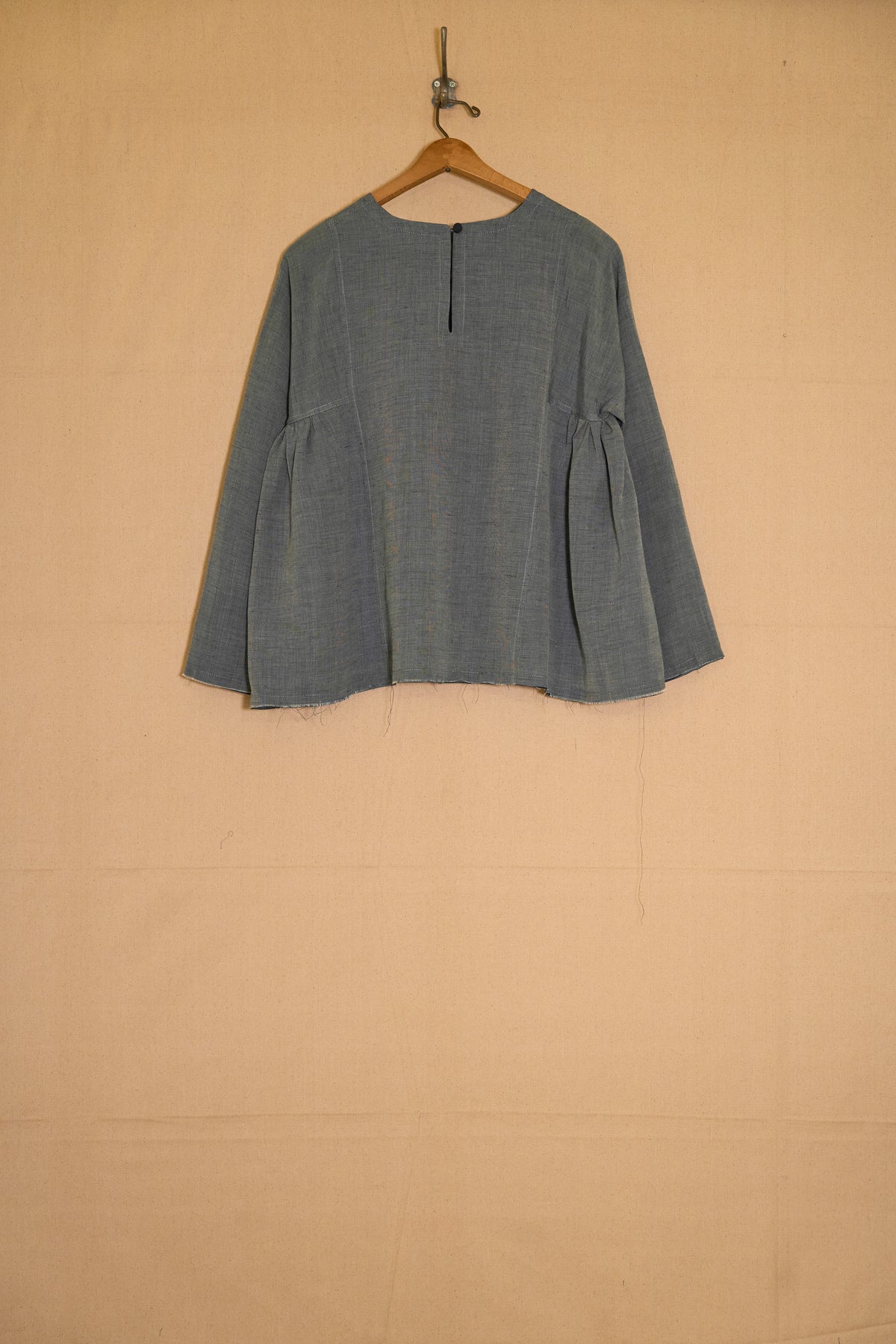 UNISECON Leona top in blue back view
