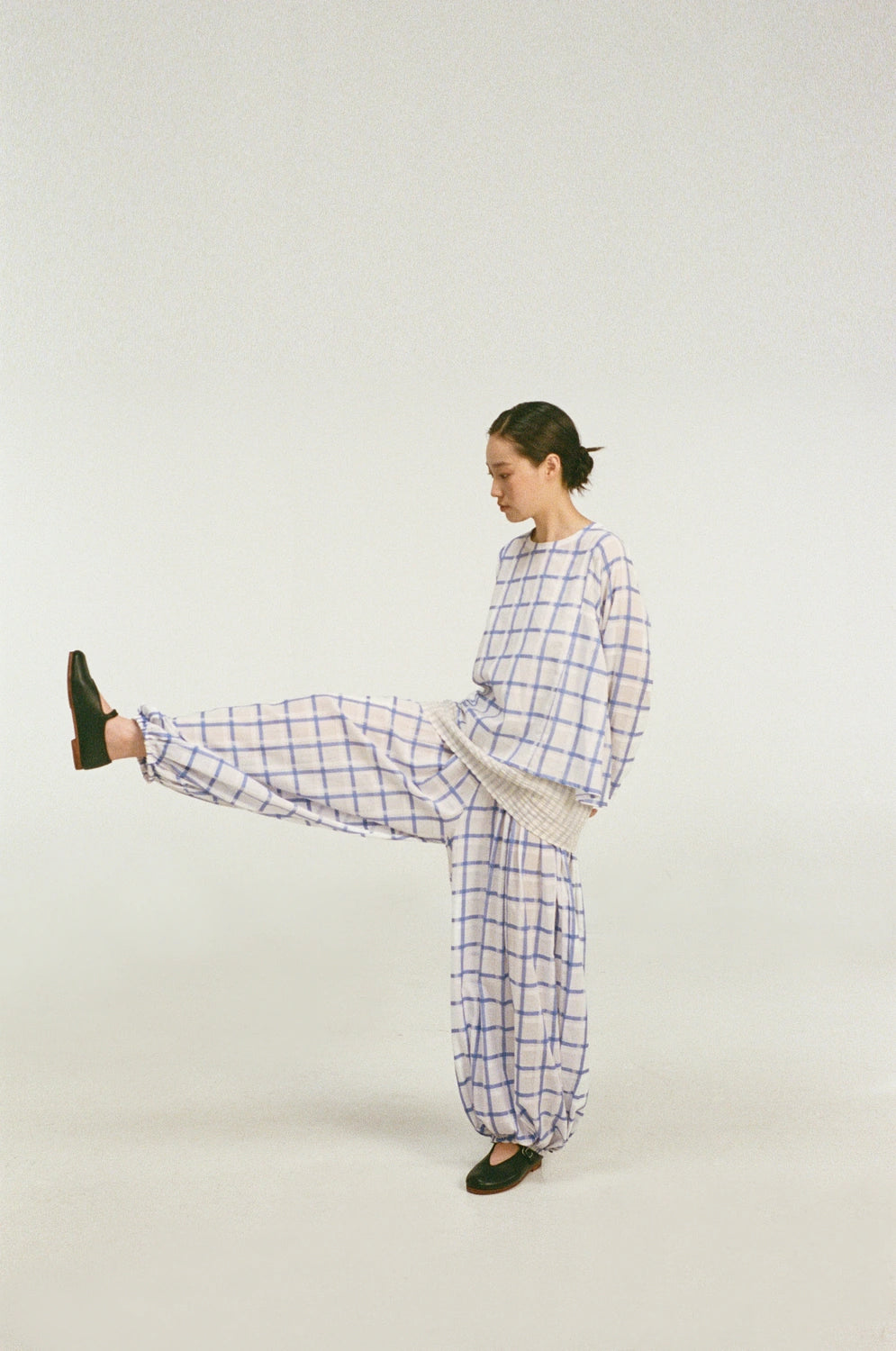 unisecon-leona-top-white-blue-front-view-pose