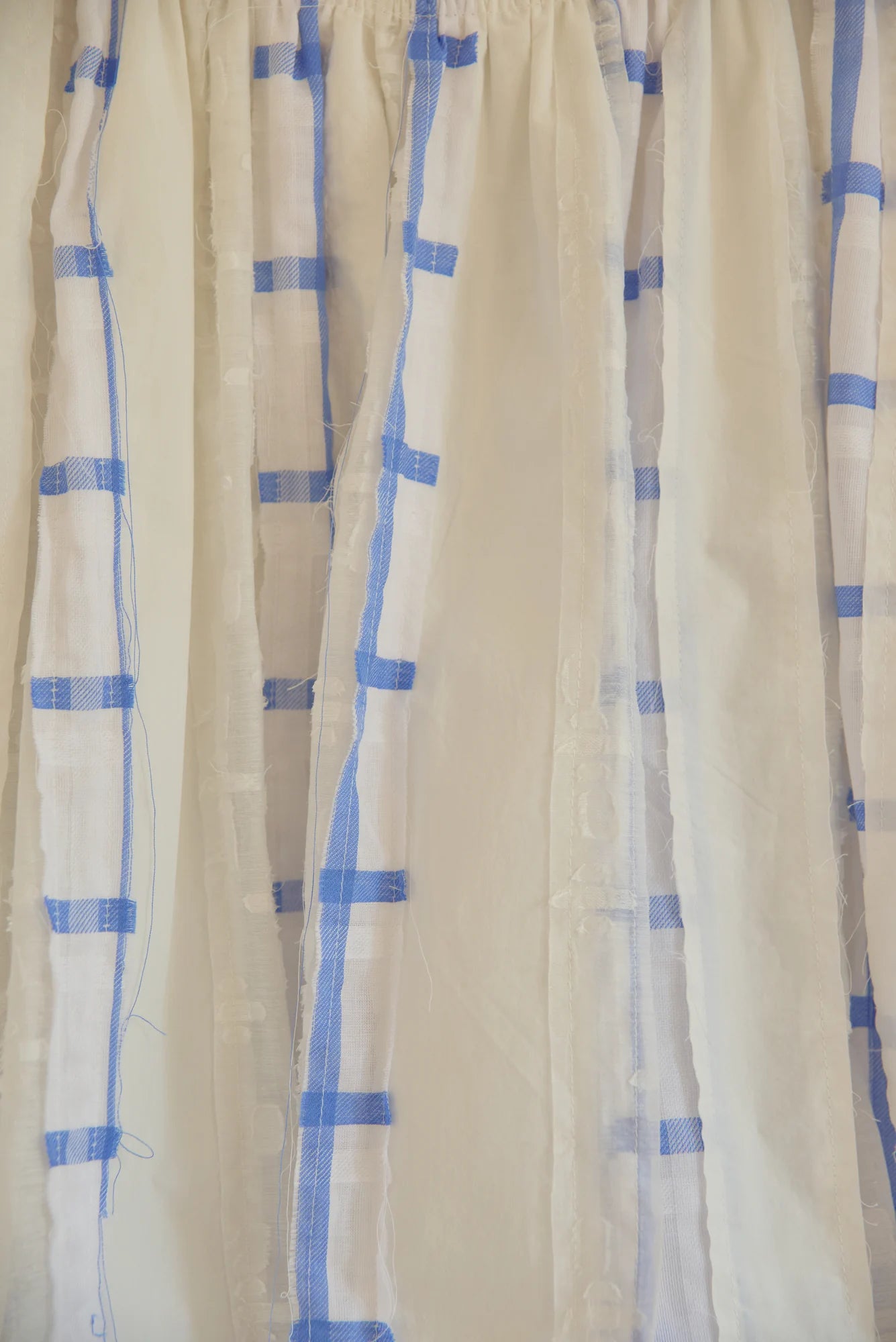 UNISECON Orr top in white/blue, detail view