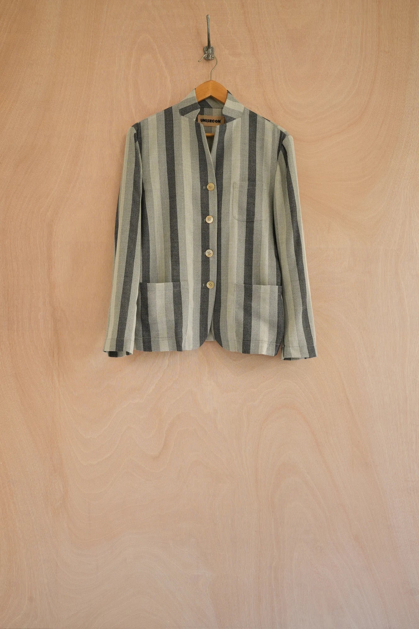 UNISECON Patcha jacket in grey, front view