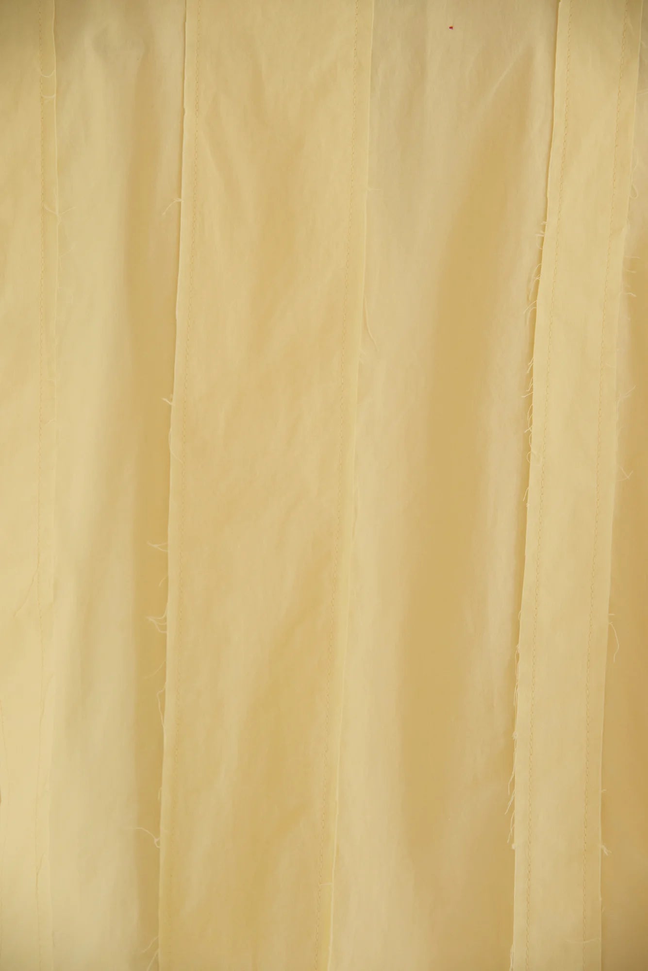 UNISECON Patcha jacket in yellow, detail view
