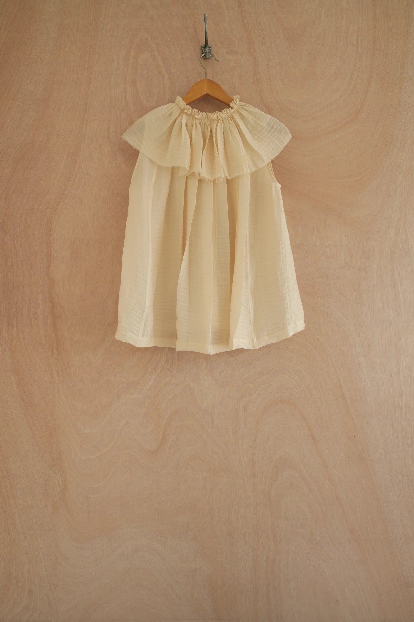 UNISECON Rae top in yellow, back view