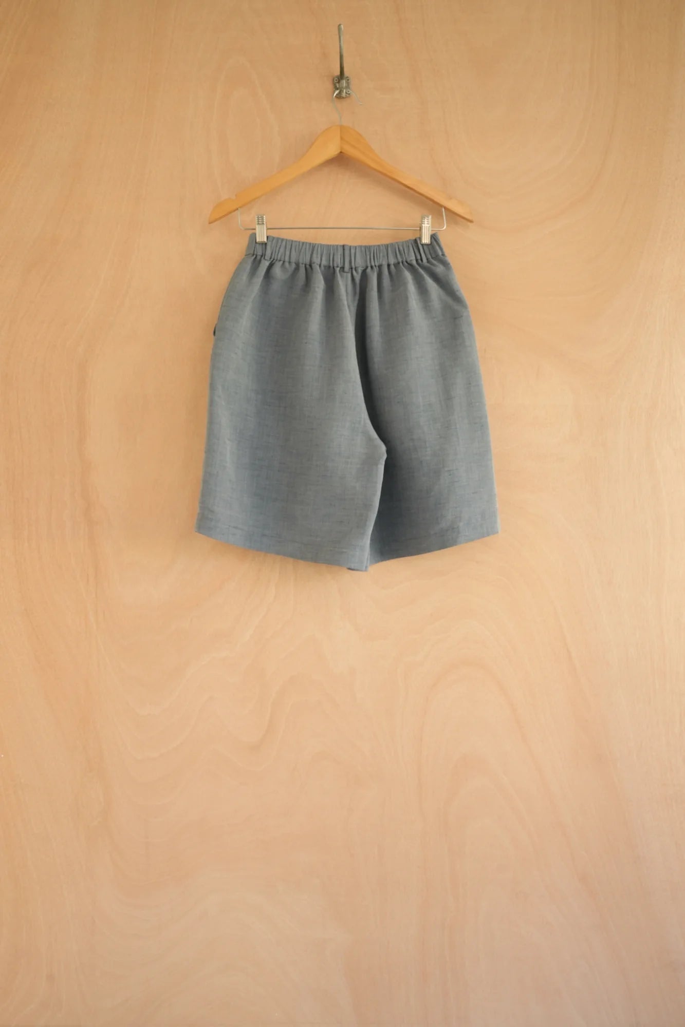 UNISECON Revi short in blue, back view