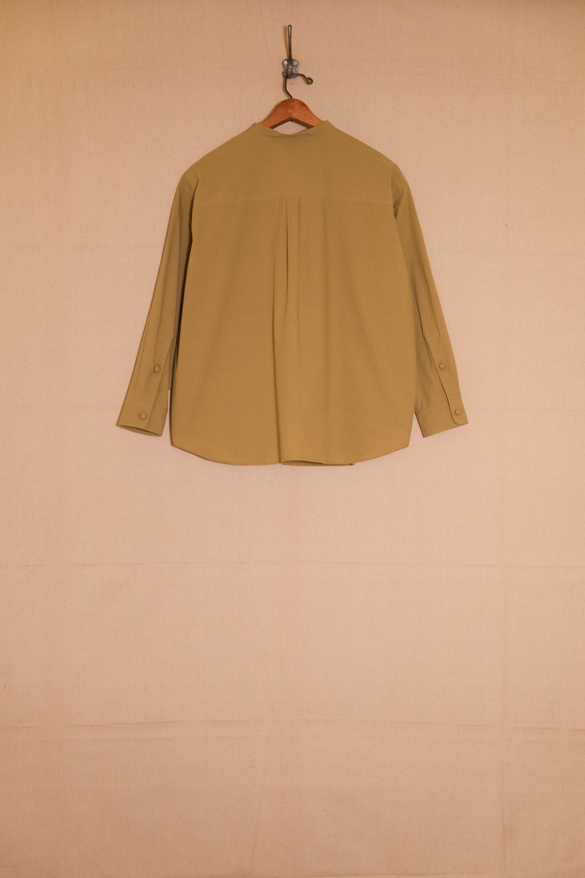 UNISECON Tyra top in chartreuse back view