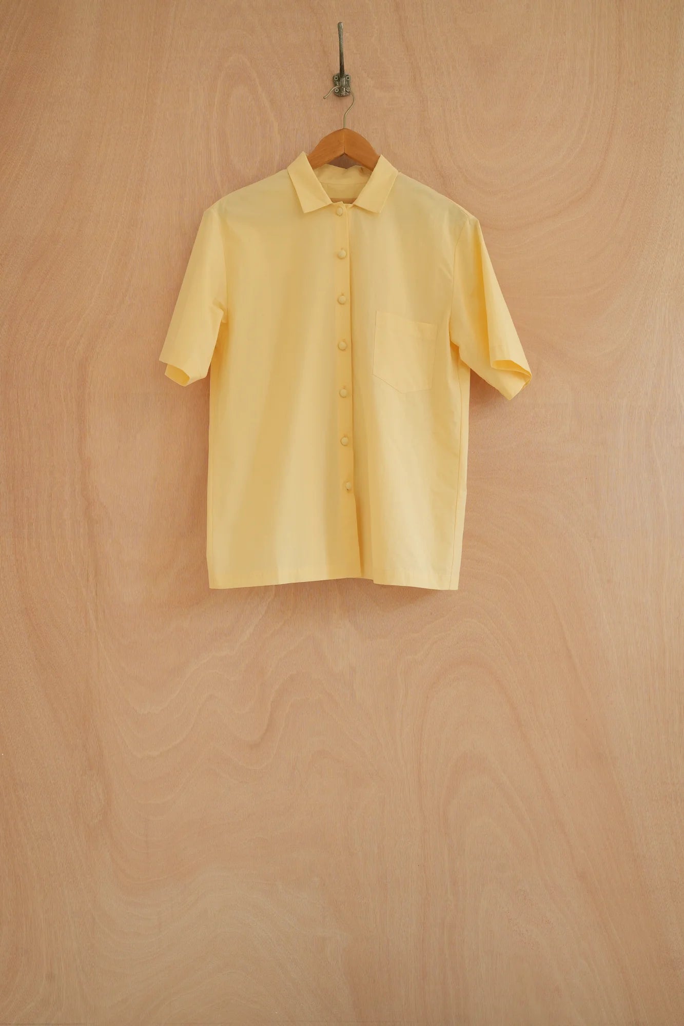 UNISECON Wei top in yellow, front view
