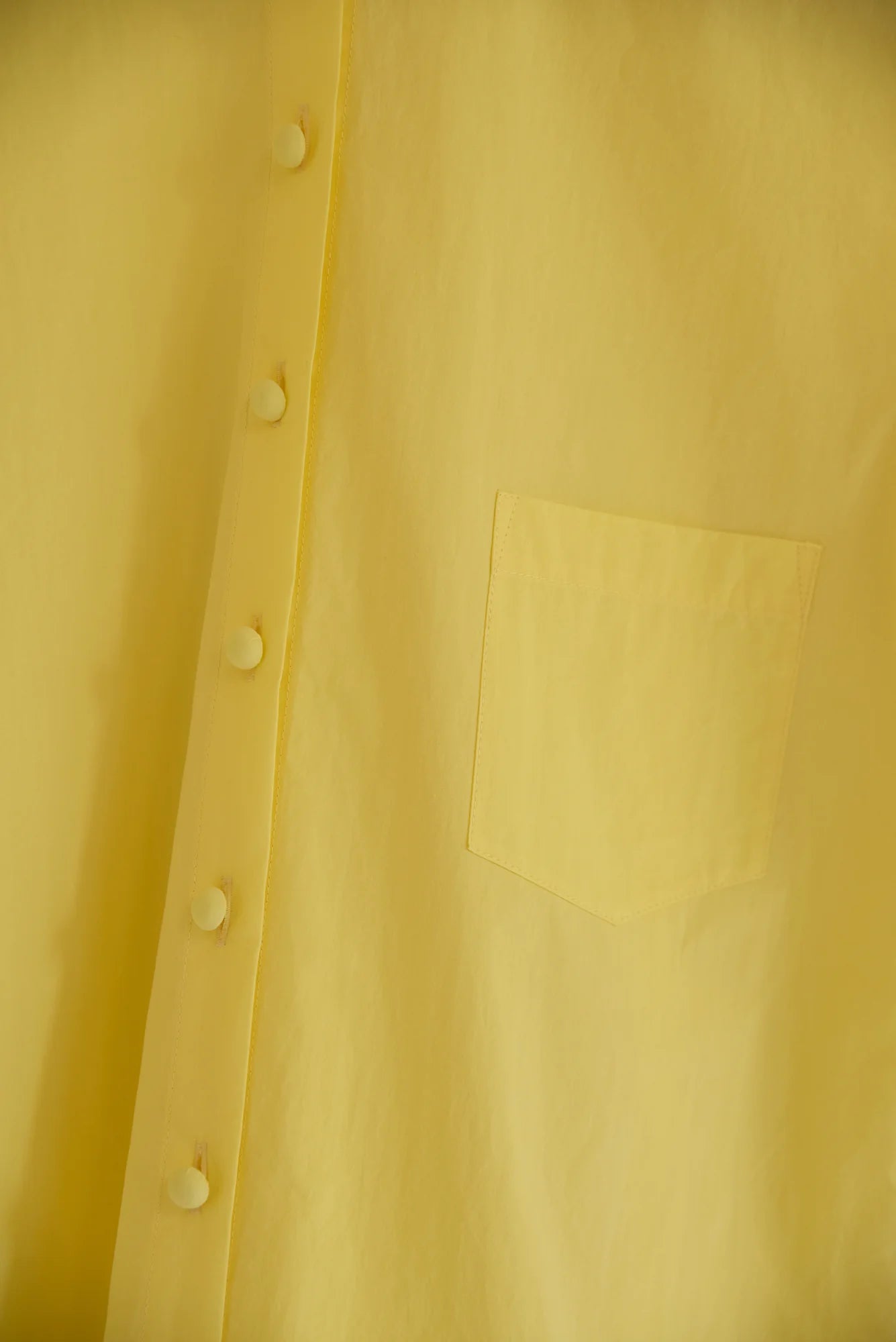 UNISECON Wei top in yellow, detail view